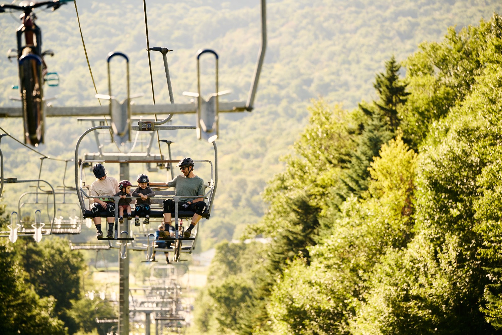 A Family Rides The Vista Lift in Summer